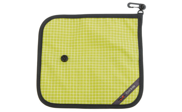 The back of a Tool Pen Wrap in Wasabi (green with white grid) 200 Halcyon.